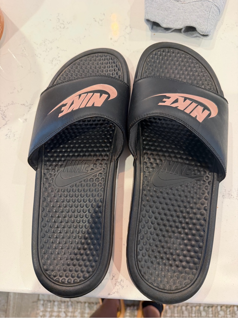Nike Men’s Black Slides with Pink Logo